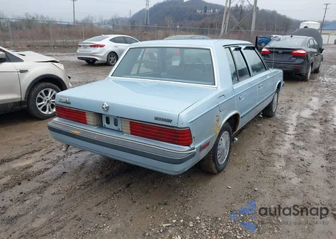 1985 Plymouth Reliant z USA, uszkodzony, nr VIN 1P3BP26C2FF159366